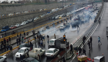 People protest against increased petrol prices in Tehran, November 16 (Reuters/Nazanin Tabatabaee)