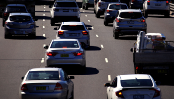 Cars drive along a main road during peak hour in Sydney, Australia (Reuters/David Gray)