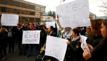 Amid government paralysis, protesters demand official action after photographs emerge of children tied to beds and radiators in a children with special needs institution in Sarajevo, November 21 (Reuters/Dado Ruvic)