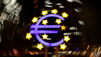 The euro sign is photographed in front of the former head quarter of the European Central Bank in Frankfurt, Germany, April 9 (Reuters/Kai Pfaffenbach)