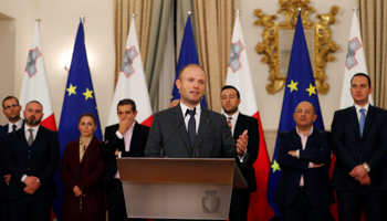 Maltese Prime Minister Joseph Muscat addresses a press conference after an urgent Cabinet meeting at the Auberge de Castille in Valletta, Malta, November 29 (Reuters/Yara Nardi)
