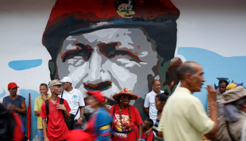 A mural of late Venezuelan President Hugo Chavez in Caracas (Reuters/Carlos Jasso)