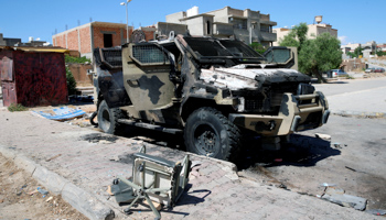 A destroyed vehicle belonging to eastern forces led by Khalifa Haftar is seen in Gharyan, south of Tripoli, June 27 (Reuters/Ismail Zitouny)