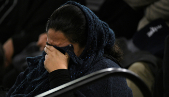 An attendee reacts during a Canadian memorial service for the victims of a Ukrainian passenger plane that crashed in Iran, January 12, 2020 (Reuters/Candace Elliott)