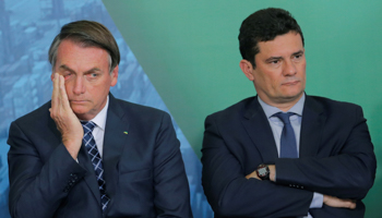 President Jair Bolsonaro (l) and Justice Minister Sergio Moro (Reuters/Adriano Machado)