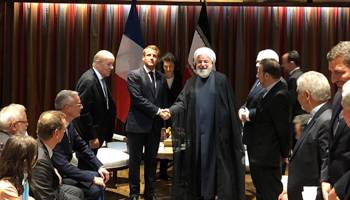 French President Emmanuel Macron shakes hands with Iranian President Hassan Rouhani during their meeting on the sidelines of the United Nations General Assembly in New York, US, September 23, 2019 (Reuters/John Irish)