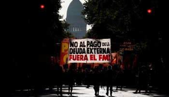 Demonstrators outside Congress with a banner saying ‘No repayment of foreign debt. IMF out!’ (Reuters/Agustin Marcarian)