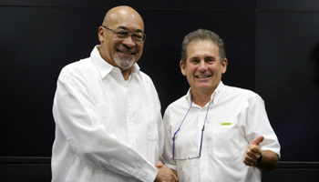 President Desi Bouterse (l) and state oil company Staatsolie director Rudolf Elias following the Maka-Central 1 announcement (Reuters/Ranu Abhelakh)