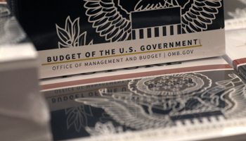 Copies of US President Donald Trump's budget proposal for the 2021 fiscal year. (Reuters/Leah Millis)