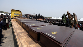 A truck carries the coffins of people killed in intercommunal clashes in Makurdi, Benue State, Nigeria, January 11, 2018 (Reuters/Afolabi Sotunde)