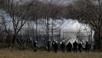 Greek riot police use tear gas at the Pazarkule-Kastanies border crossing, March 7 (Reuters/Florion Goga)
