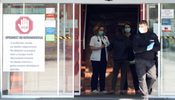 Medical staff wearing face masks inside the Dubrava hospital in Zagreb, March 15 (Reuters/Antonio Bronic)