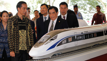 Indonesian President Joko Widodo and the general manager of China Railway, Sheng Guangzu, at a ground breaking ceremony for the Jakarta-Bandung railway in 2016 (Reuters/Garry Lotulung)