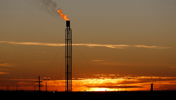 A flare burns excess natural gas in the Permian Basin in Loving County, Texas, November 23, 2019 (Reuters/Angus Mordant)