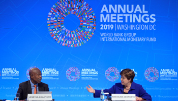 IMF chief Kristina Georgieva speaks with South Africa's Reserve Bank Governor Lesetja Kganyago, October 19, 2019 (Reuters/Mike Theiler)