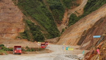 Trucks are seen as copper output began at the Chinese-owned Mirador mining project in Tundayme, Ecuador July 18, 2019 (Reuters/Daniel Tapia)