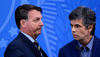 President Jair Bolsonaro (l) and new Health Minister Nelson Teich (Reuters/Adriano Machado)