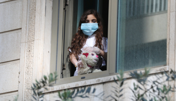 A Lebanese girl evacuated from abroad quarantined in a Beirut hotel (Reuters/Mohamed Azakir)