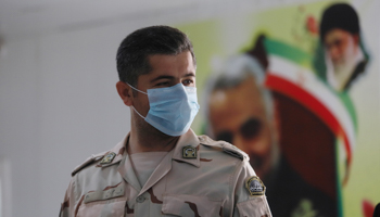 An Iranian Border Guard wearing a face mask against COVID-19 (Reuters/Essam al)