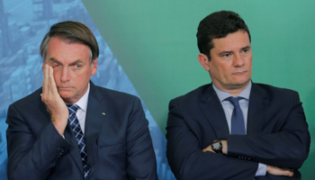 President Jair Bolsonaro (l) and outgoing Justice Minister Sergio Moro in December 2019 (Reuters/Adriano Machado)