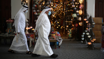 Men in Bahrain wearing protective masks to shop ahead of Ramadan under COVID-19 protection measures (Reuters/Hamad I Mohammed)