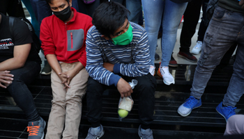Peruvians stranded in Chile following the border closure and suspension of transport (Reuters/Ivan Alvarado)