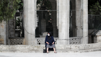 A woman visits the Eyup Sultan mosque as the coronavirus curfew on the over-65s is lifted for six hours, Istanbul, May 17 (Reuters/Umit Bektas)