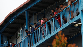 Foreign workers at a Singapore dormitory, amid the COVID-19 outbreak (Reuters/Edgar Su)