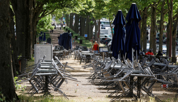 Empty chairs and tables of cafes and restaurants around the Chateau de Versailles on its reopening day in Versailles, near Paris, France (Reuters/Charles Platiau)