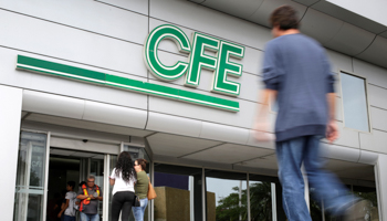 The logo of Mexico's CFE is seen at its office building in Monterrey, November 5, 2019 (Reuters/Daniel Becerril)