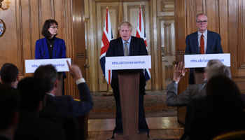 Britain's Prime Minister Boris Johnson, Deputy Chief Medical Officer Dr Jenny Harries and Chief Scientific Adviser Sir Patrick Vallance (Reuters/Eddie Mulholland)