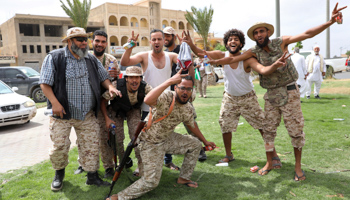 Fighters loyal to Libya's internationally recognised government celebrate after regaining control over Tarhouna city, Libya, June 5 (Reuters/Ismail Zitouny)