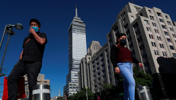 People walk in the Alameda Central park after it was reopened to the public as the COVID-19 outbreak continues in Mexico City, Mexico, June 14 (Reuters/Carlos Jasso)