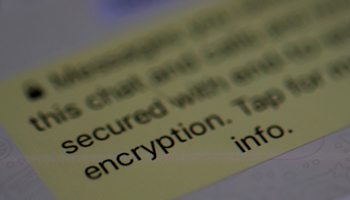 An encryption message on the WhatsApp application (Reuters/Phil Noble)