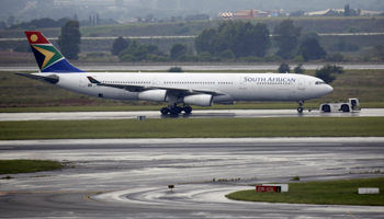 A South African Airways (SAA) Airbus A340-300 plane is towed at OR Tambo International Airport in Johannesburg, January 18 (Reuters/Rogan Ward)