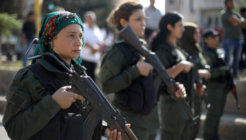 Kurdish policewomen guard a protest march against Turkey in Qamishli, Syria, October 2019 (Reuters/Muhammad Hamed)