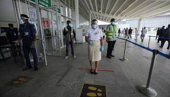  A health worker is seen at the airport during preparation ahead of the reopening of the airport for domestic flight operations in Abuja, Nigeria July 6  (Reuters/Afolabi Sotunde)