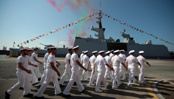 French sailors march past the frigate Courbet in the French naval base at Abu Dhabi. United Arab Emirates, November 24, 2019 (Reuters/Christopher Pike)