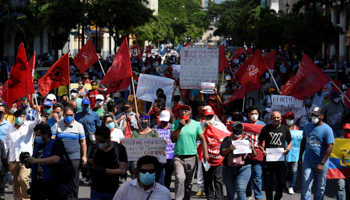 Protesters march against economic measures imposed by Ecuador's President Lenin Moreno amid the COVID-19 outbreak in Guayaquil, Ecuador May 25 (Reuters/Santiago Arcos)