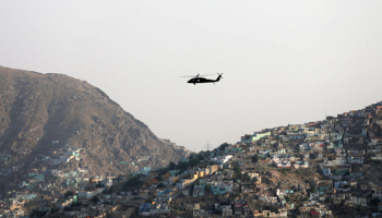 A NATO helicopter over Kabul (Reuters/Omar Sobhani)