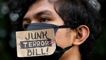 A protester during a demonstration last month against the new anti-terrorism legislation (Reuters/Eloisa Lopez)