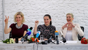 Election candidate Svyatlana Tikhanouskaya (centre), supported by Maria Kolesnikova (R) and Veranika Tsapkala, originally from different campaign teams (Reuters/Vasily Fedosenko)