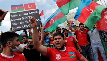 Azerbaijanis at a nationalist protest in Istanbul, Turkey. The banner denounces Armenians (Reuters/Murad Sezer)