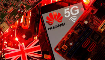 The UK flag and a smartphone with a Huawei and 5G network logo on a PC motherboard (Reuters/Dado Ruvic)