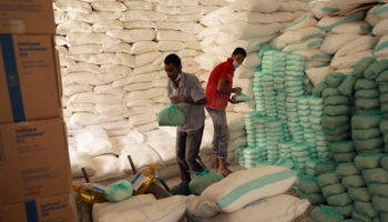 Preparation of food aid for distribution in Yemen during the pandemic (Reuters/Khaled Abdullah)