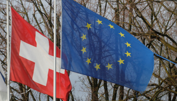 EU and Swiss flags in Steinhausen, Switzerland (Reuters/Arnd Wiegmann)