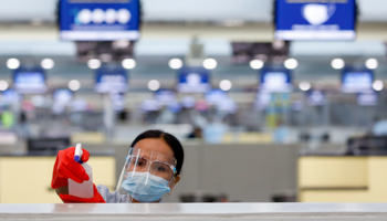 A worker wearing personal protective equipment in Ninoy Aquino International Airport in Pasay City, Metro Manila, Philippines (Reuters/Eloisa Lopez)