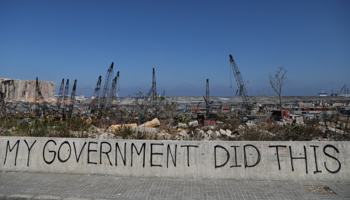 Graffiti overlooking the devastation at Beirut Port (Reuters/Goran Tomasevic)