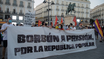 Protesters hold a banner during a protest against Spain's monarchy, Madrid, Spain (Reuters/Javier Barbancho)