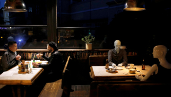 Bar reopens with mannequins placed to help social distancing, Istanbul, June 1 (Reuters/Umit Bektas)